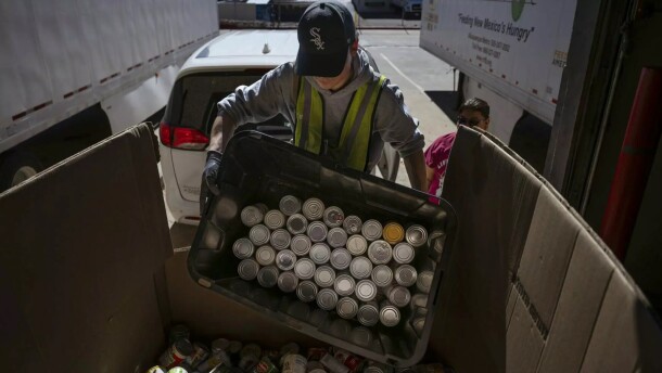 Tito Santiago unloads canned goods and other food donations from Albuquerque High School’s drama department at Roadrunner Food Bank in Albuquerque in this October 2025 file photo.