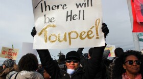 Donna Dean-Wright holds a sign at the Seattle women's march on Saturday, January 21, 2017. 