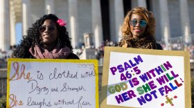 Tiana Ottley (left) and Syerra Graham stand near the Lincoln Memorial. Graham said she wanted to "shine a light on Christianity."