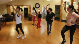 Instructor Nancy Navarro (from left) leads Digna Quispe, Yanina Cuentas, Mercedes Ozorio and Melanie Alzamora through a Marina Fit class.