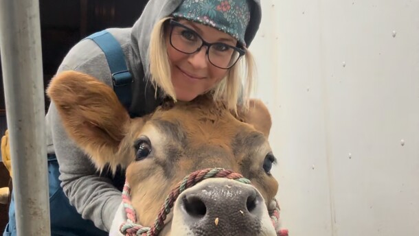 Kelli Foreman and one of her current milking cows, Maggie and Feather. She'll have a third cow ready to start milking in mid-December, named Ellie Mae.