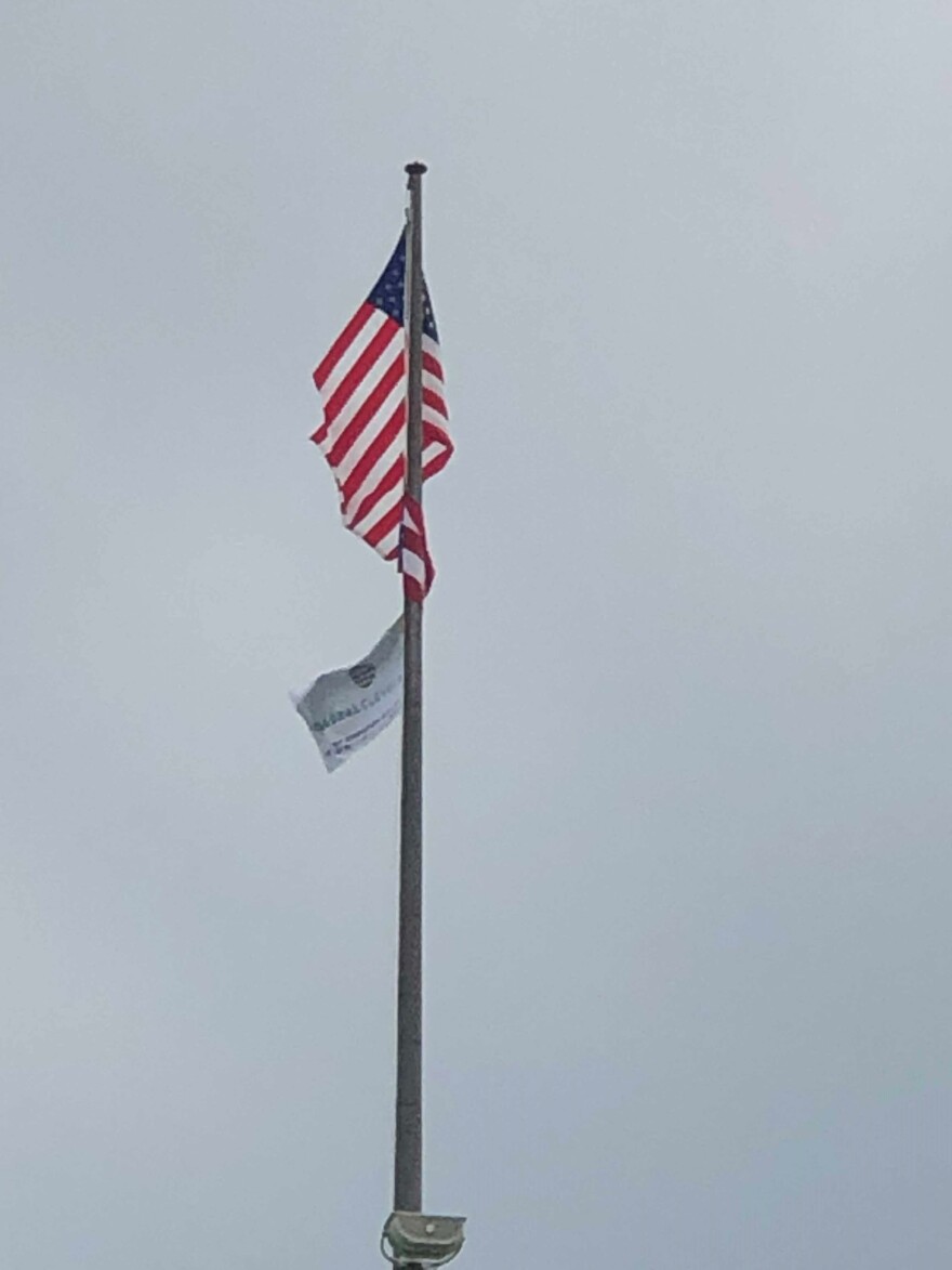 A photo of Global Cleveland's flag flying.