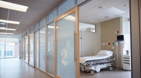 Empty hospital hallway and room