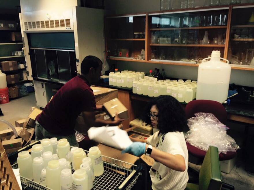 Students in the research lab at Virginia Tech prepare to test water samples from Flint. 