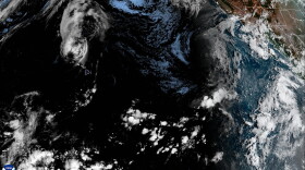 A satellite image shows Hurricane Lowell's center having moved north of Niʻihau and Kauaʻi early Tuesday morning, Sept. 8, 2026.