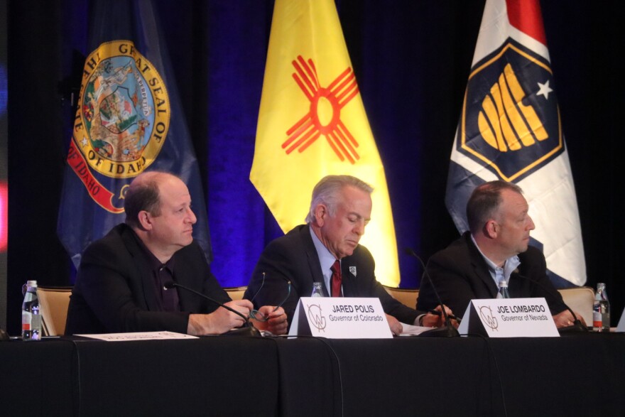 rom left, Colorado Gov. Jared Polis, Nevada Gov. Joe Lombardo and Hawaii Gov. Josh Green sit during a panel discussion on using federal land for affordable housing.