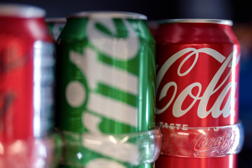 Cans of Coca-Cola products are displayed for sale at Hawthorne Market on Tuesday, Jan. 6, 2026, in Portland, Ore.