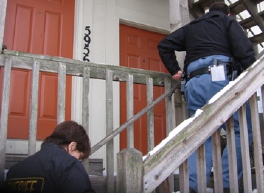 Deputies Tracy Ocamb (L), Steve Neumer (R) with eviction order in back pocket.