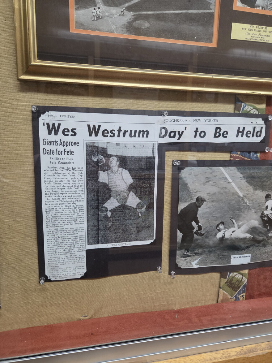 A display shows newspaper clippings of Wes Westrum, a Clearbrook native who played Major League Baseball in the 1950s. The display is in Clearbrook City Hall.