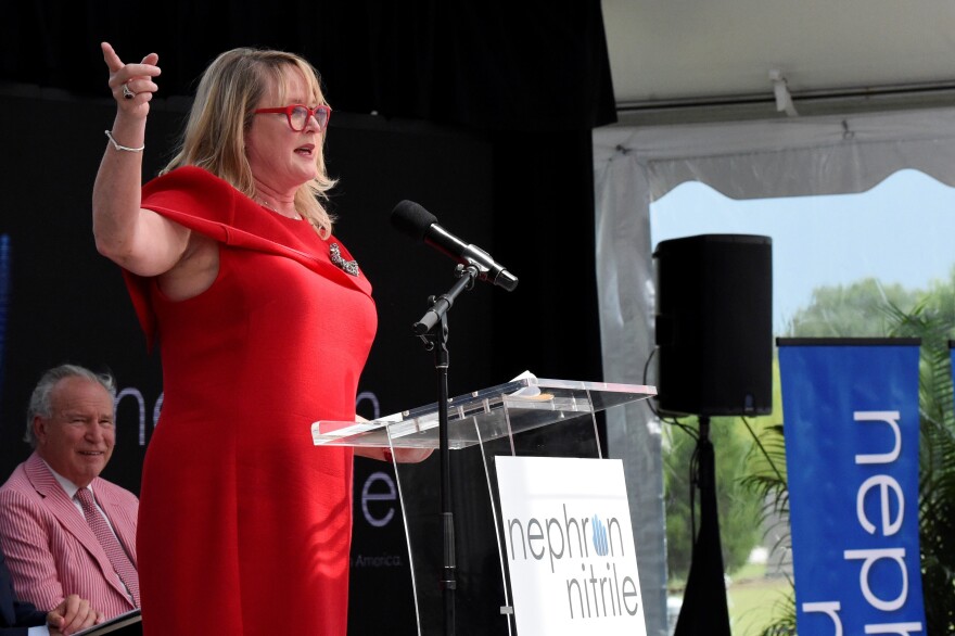 Nephron Pharmaceuticals Corp. CEO Lou Kennedy speaks during the rollout of her new company, Nephron Nitrile, which Kennedy says will manufacture medical gloves as part of an effort to shore up the U.S. medical supply chain, Thursday, July 15, 2021, in West Columbia, S.C. (AP Photo/Meg Kinnard)