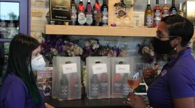 Jennifer McDonald prepares to-go orders at her urban winery, Jenny Dawn Cellars, in Wichita, Kansas in August 2020. 