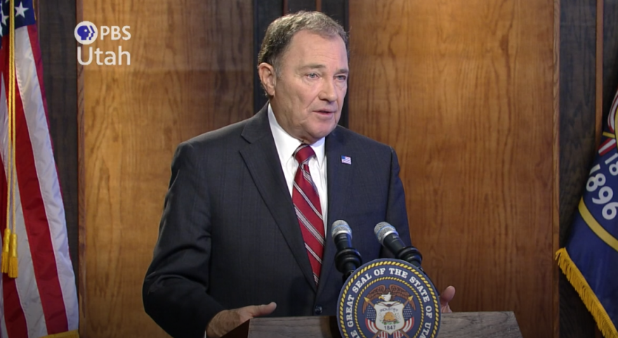 Screengrab from video of Gary Herbert speaking at a podium