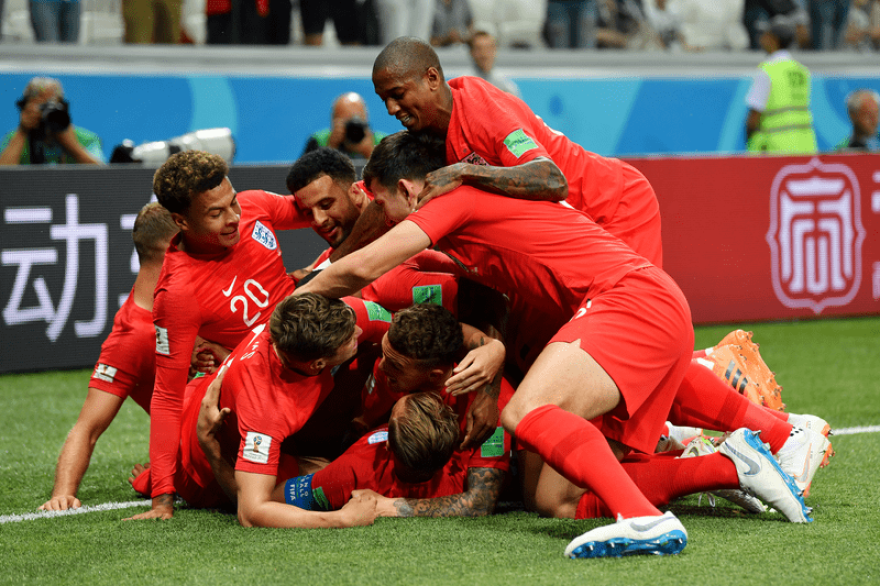 Scarves aloft Ali Samaniego, at left, and Veronica Brewer, celebrate at a region-wide watch party for the Final Draw. In the countdown to the FIFA World Cup 26, the event drew a crowd Friday morning to KC Live! in the Power & Light District.