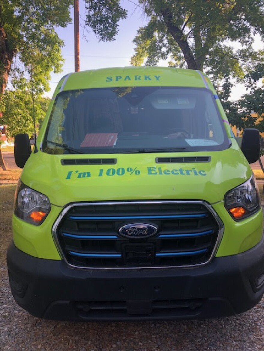 A bright colorful van named Sparky