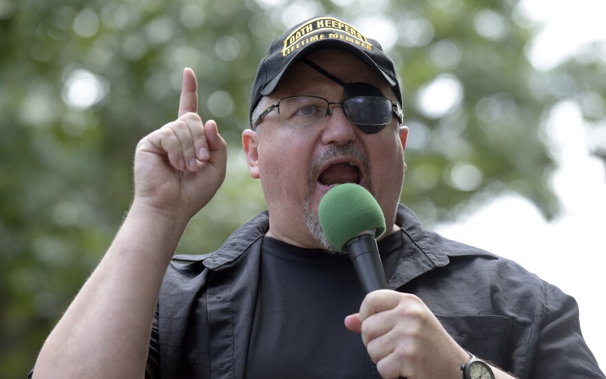In this 2017 file photo, Stewart Rhodes, founder of the Oath Keepers, speaks during a rally outside the White House in Washington. Rhodes has been arrested and charged with seditious conspiracy in the Jan. 6 attack on the U.S. Capitol. 