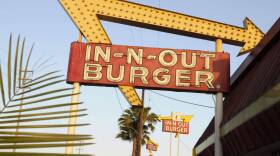In-N-Out Burger signs fill the skyline. (Adam Lau/AP)
