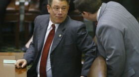 State Rep. Mike Christian, R-Oklahoma City, (left) on the floor of the Oklahoma House, March 2, 2015.
