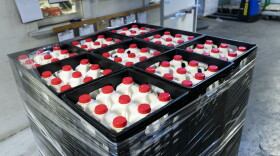 Milk is wrapped and ready to be distributed at the Facing Hunger Food Bank.
