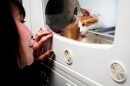 Becky Kling, 62, of Creve Coeur, looks at “Jalapeño,” a 5-month old kitten, on Tuesday, Jan. 31, 2023, at the APA Olivette Animal Shelter in Olivette. Kling said she lost four of her pets the last year, including her 20-year-old cat and now was considering getting a new furry family member.