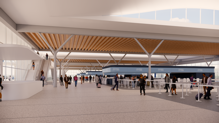 A rendering of the concourse level of the new A/D hall featuring high ceilings with exposed wooden beams and large windows allowing in natural light. Travelers can be seen milling about.