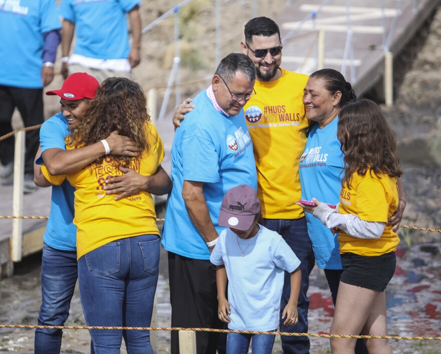 The Border Network for Human Rights hosted "Hugs Not Walls" an event that reunited families separated by immigration status. Hundreds of families in El Paso and Juarez waited to meet on a wood platform in the middle of a dry part of the Rio Grande. 