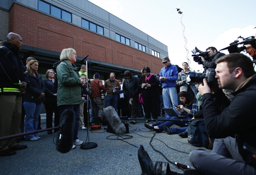 Media convene at Arlington City Hall to listen to Sen. Patty Murray speak the day after the deadly landslide in Oso, Washington.