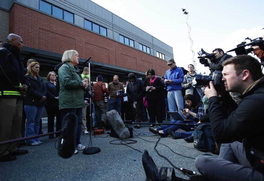 Media convene at Arlington City Hall to listen to Sen. Patty Murray speak the day after the deadly landslide in Oso, Washington. 