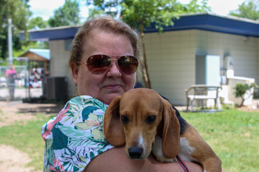 Sherry Decker traveled from the Lansing area to adopt one of the beagles. She says her family will decide on a name for their newest member.