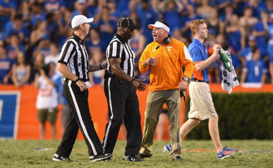 Tennessee coach Butch Jones argues with an umpire after the Volunteers' first attempt at a 55-yard field goal.