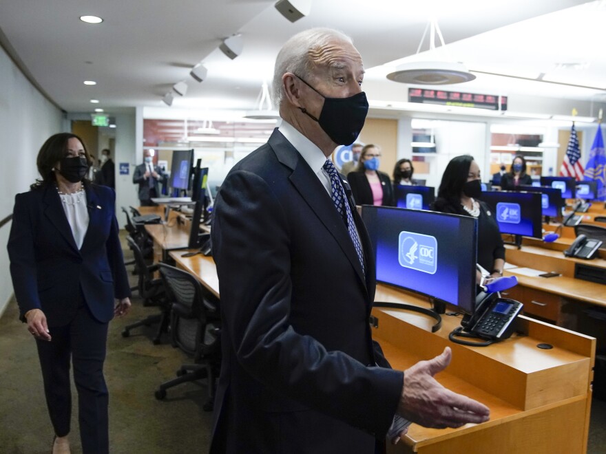 President Biden and Vice President Harris arrive for a COVID-19 briefing at the headquarters for the Centers for Disease Control and Prevention in Atlanta on Friday.