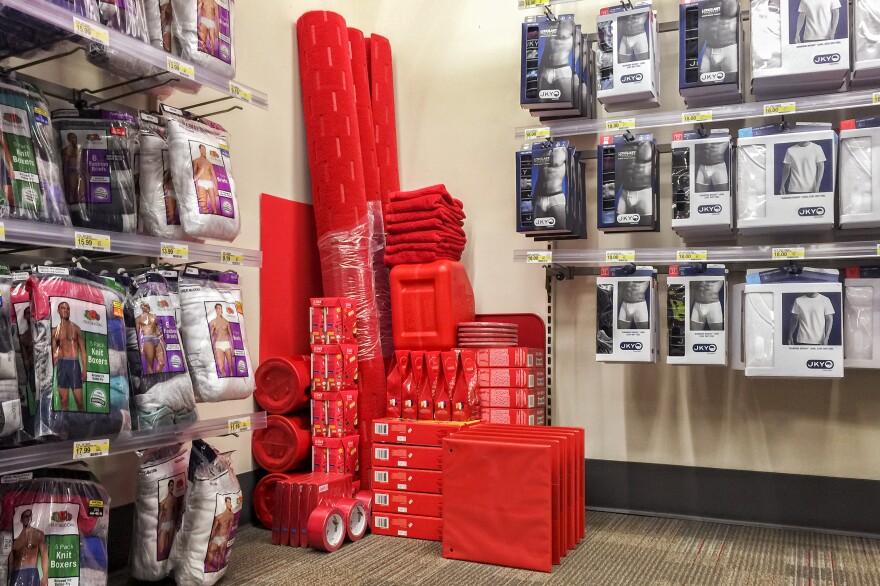 Art amid the underwear: Brown chooses a color, "shops" the store to find items and then sets them up into impromptu sculptures in the store.