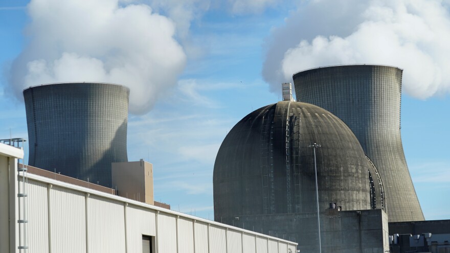 A nuclear reactor and two cooling towers are shown at Georgia Power's Plant Vogtle nuclear power plant in Waynesboro, Ga. Georgia Power Co. is again delaying the projected startup for two new units at its Vogtle nuclear power plant near Augusta, saying its share of the costs will rise by a projected additional $200 million.