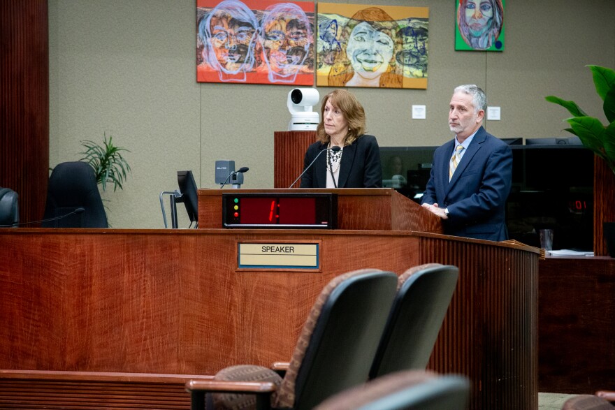 Senior Assistant Orange County Attorney Debra Babb-Nutcher (left) and attorney Lee Birnbaum address county commissioners at Tuesday's meeting. Birnbaum recently served as Orange County's in-house counsel in Osceola County's unsuccessful lawsuit challenging Orange's charter amendment protecting Split Oak Forest.