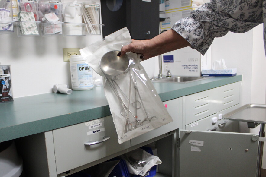 Jackie Marshall, site manager at the Mountain Family Health Center in Glenwood Springs, holds an IUD kit with tenaculums. Mountain Family is a local partner of FreeBC, a privately funded program that started providing free birth control to Coloradans in May.