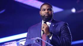 U.S. Congressman Byron Donalds speaking with attendees at the 2025 AmericaFest at the Phoenix Convention Center in Phoenix, Arizona.