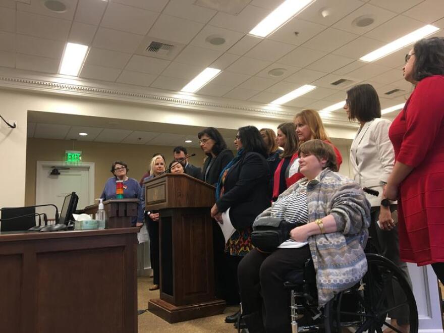 Democratic lawmakers and housing activists unveil a package of housing reforms at an Olympia news conference on Feb. 7.