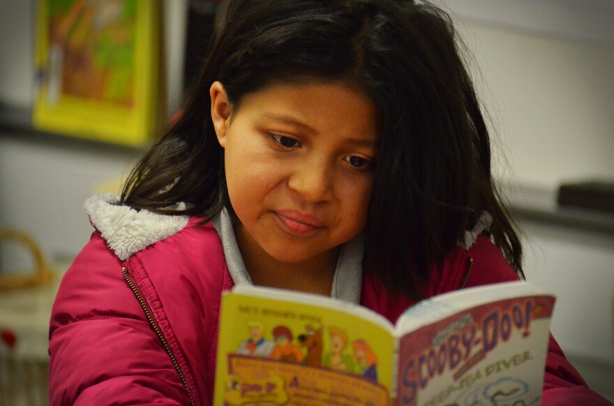 Yasmin Gonzalez reads a fun mystery during her independent reading time.