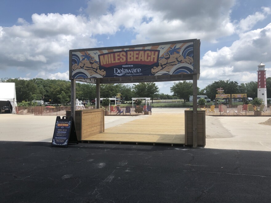 "Miles Beach", a mock beach meant to connect Dover Motor Speed to the summer tourism scene, is constructed at the Monster Mile