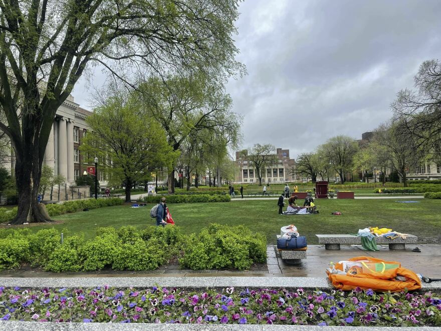 People take down the pro-Palestinian encampment at the University of Minnesota in Minneapolis, Minn., on Thursday.