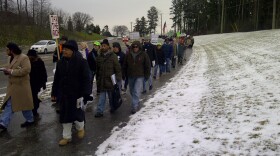 Protestors march to Gov. Rick Snyder's neighborhood.