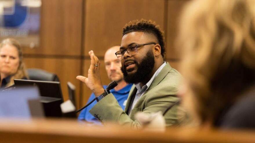 Independence school board member Anthony Mondaine speaks during a July 12, 2022, board meeting at the district headquarters. Mondaine was the lone “no” vote on a proposal to remove a book from elementary schools during the board’s June meeting. In recent years, split votes have become more common.