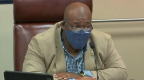 The Rev. Eric Cummings, shown here in his role as a Marion County School Board member, is among dozens of pastors joining in a moratorium on indoor memorial services and funerals. They'll be hold them outdoors. Image: MCPS via YouTube