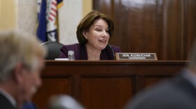 Senate Rules Committee Chair Amy Klobuchar, D-Minn., presides Tuesday over a markup of the For the People Act, which would expand access to voting and make other election reforms. The bill was already passed by Democrats in the House.