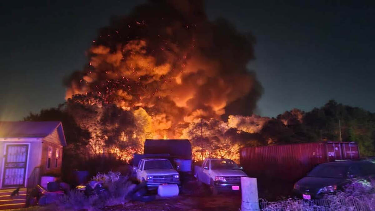10-acre grass fire contained after days-long fight in Sand Branch — a community without water
