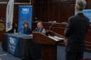 Political Reporter Ian Donnis (right) moderates a discussion between Ken Block and Helena Foulkes. Credit: Rose Wheeler/Ocean State Media