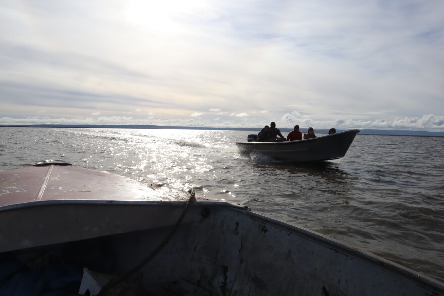 Mertarvik, the new village site for residents relocating from Newtok, is nine miles south across the Ningliq river on Nelson Island. Only a third of residents have moved to Mertarvik, which is accessible by boat. Available housing is limited, so nearly 200 people remain in Newtok.