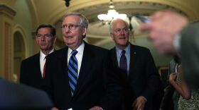 U.S. Senate Majority Leader Sen. Mitch McConnell (R-Ky.) (center), Sen. John Barrasso (R-Wyo.) (left), and Senate Majority Whip Sen. John Cornyn (R-Texas) approach the podium for a news briefing after the weekly Senate Republican Policy Luncheon July 11, 2017 at the Capitol in Washington. (Alex Wong/Getty Images)