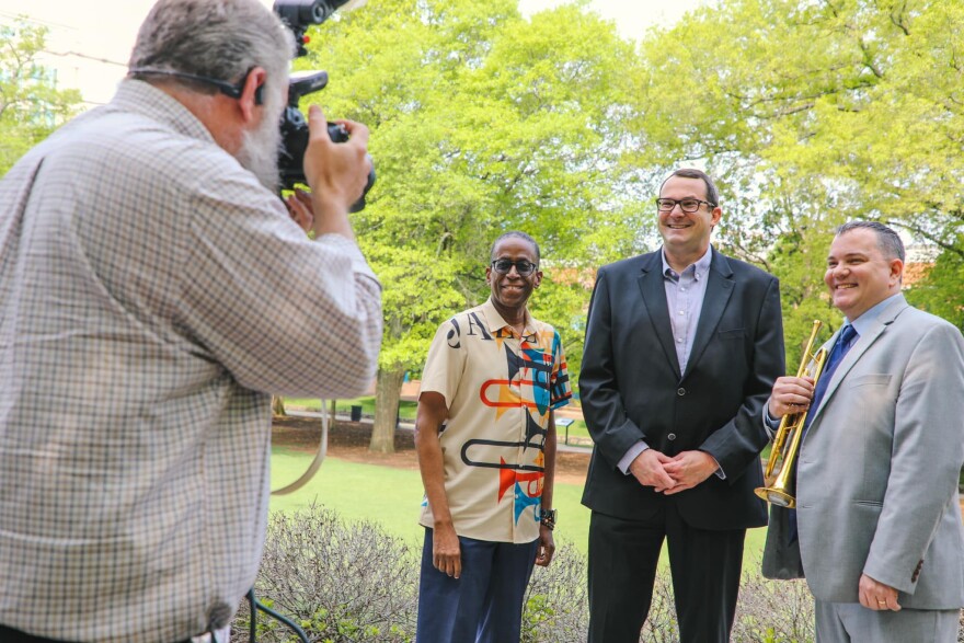 Huntville Music Officer Matt Mandrella poses with musicians