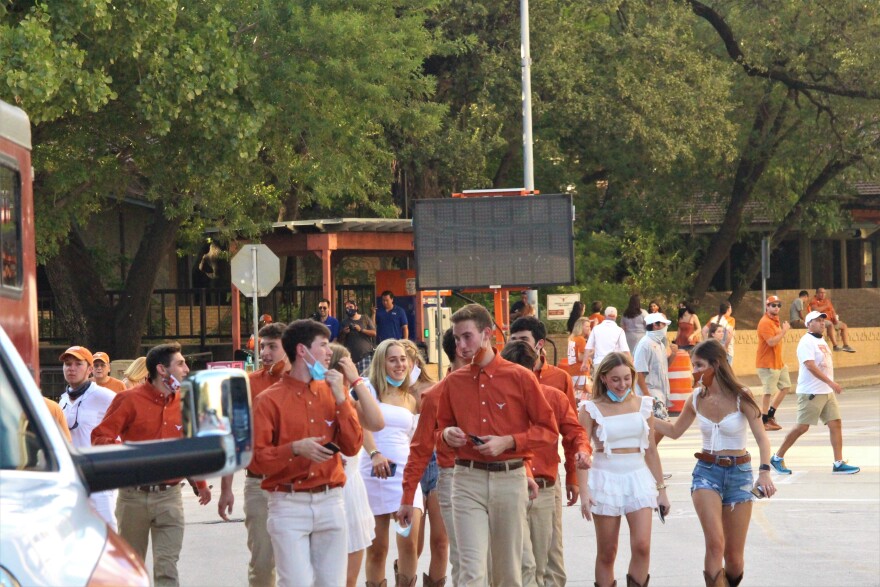 Students attend UT's first game of the 2020 season. The stadium’s capacity is limited to 25% in accordance with state law, but only UT students had to test negative ahead of the game in order to attend.