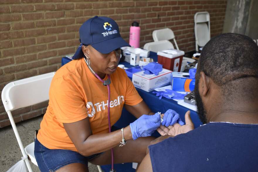woman conducts a health screening